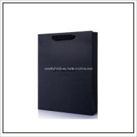 Custom Luxury Deboss Black Gold Foil UV Logo Paper Gift Bag with Ribbon Handle